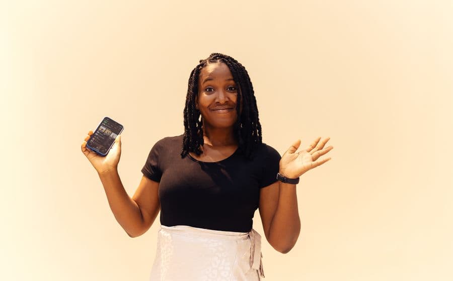 A woman holding her phone